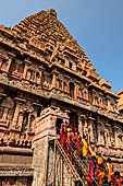 The main temple, in front an open pavilion shelters a huge monolithic Nandi. Pilgrims visiting the temple. 